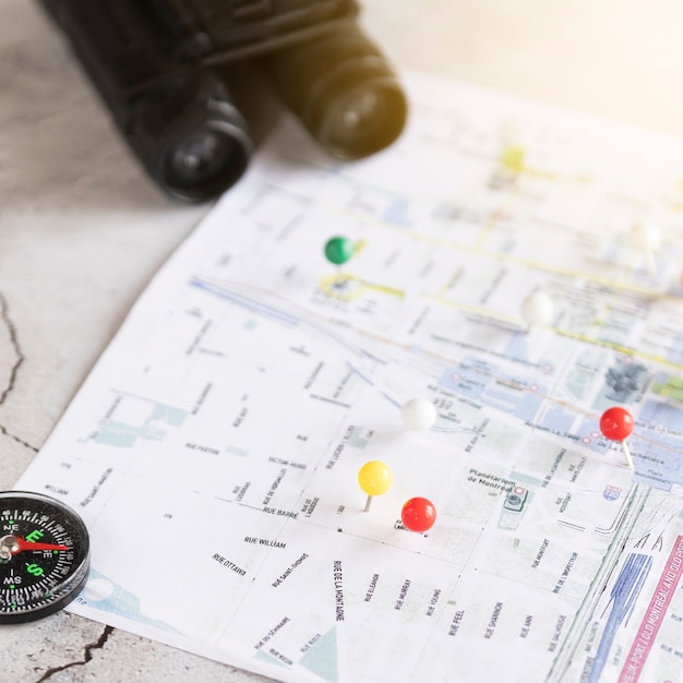 close-up-defocused-map-with-pinpoints_23-2148232424