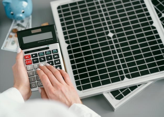 close-up-hand-typing-calculator_23-2148920635