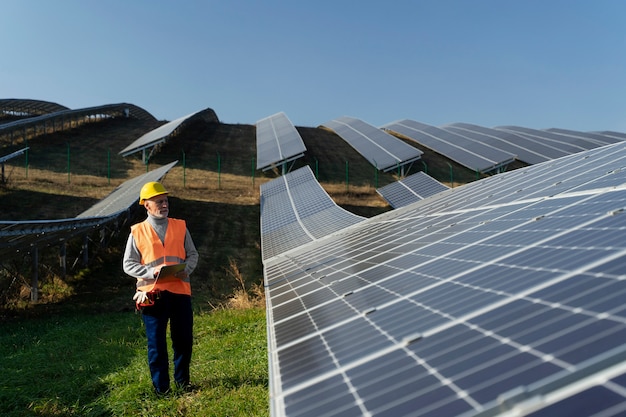person-near-alternative-energy-plant_23-2149192710