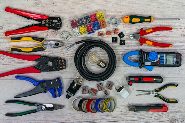 professional-electrician-tools-electrical-components-light-wooden-boards_664825-82